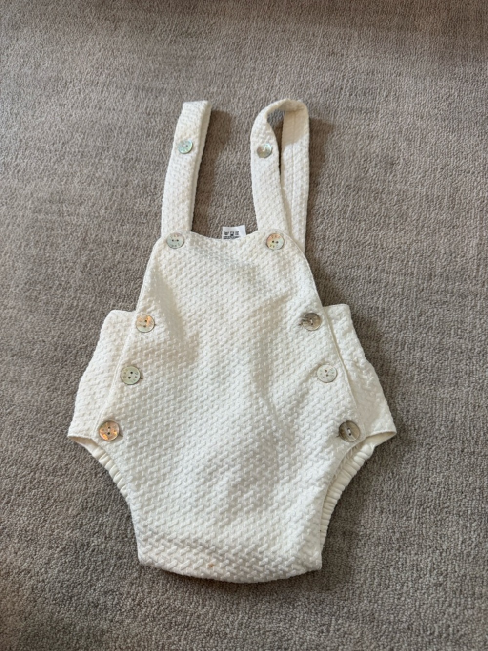 Cream Textured Baby One-Piece with Buttoned Straps